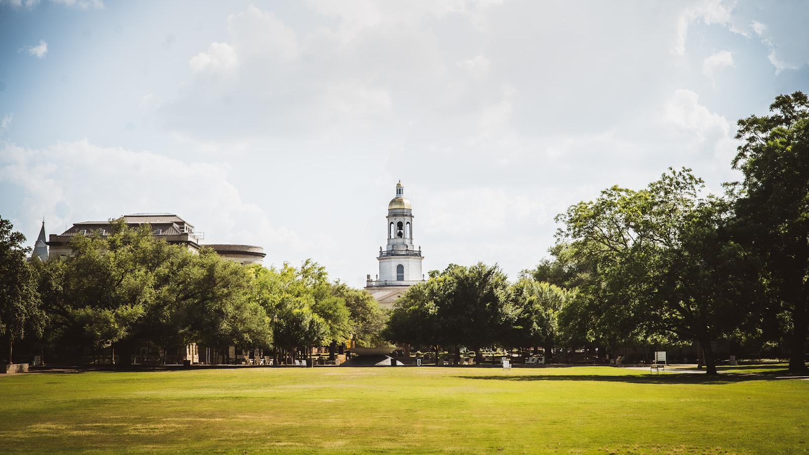 A university campus quad with a domed bell tower